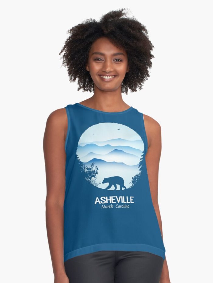 Asheville souvenir merchandise design with black bear and tree silhouette against the Blue Ridge Mountains of North Carolina.