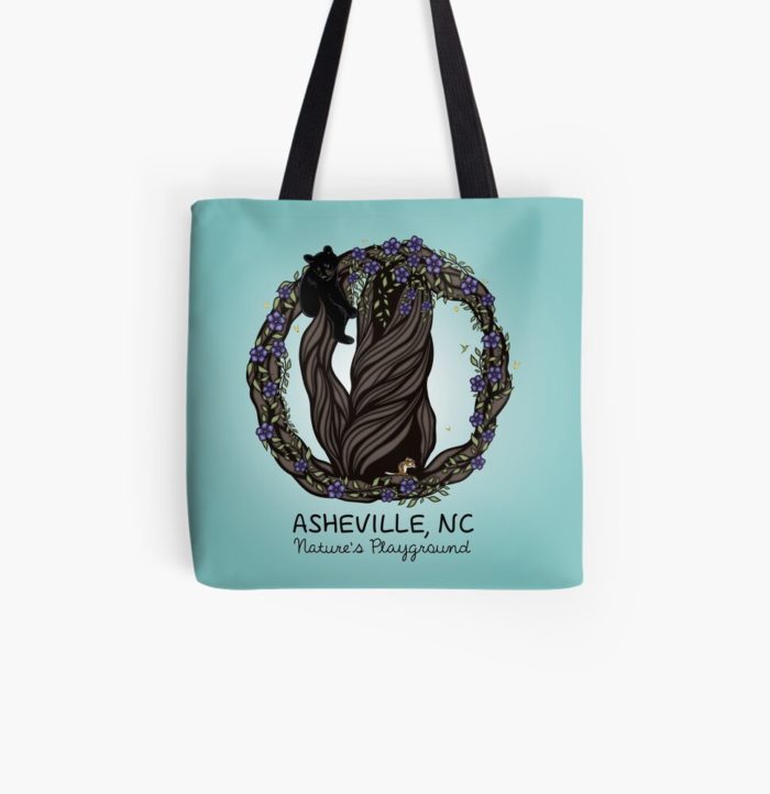 Nature's playground Asheville, North Carolina merchandise design with a black bear in a tree surrounded by other animals and nature.