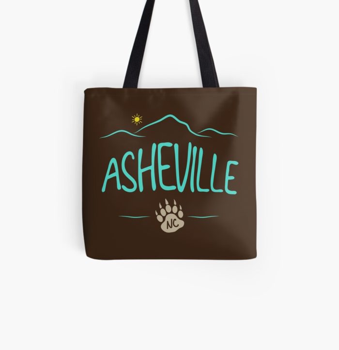 Asheville, NC design with mountains and a black bear paw print.