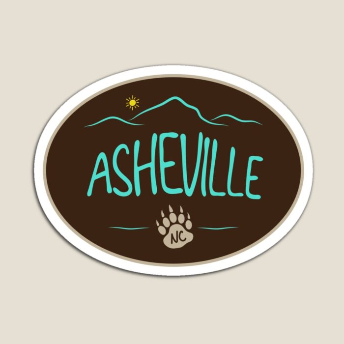 Asheville, NC design with mountains and a black bear paw print.